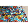 Super Hero comic - single jersey , the fabric with the fold placed across the table