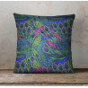 Outdoor square cushion - peacock feathers. The cushion is placed on a wooden table