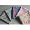 Floral fabric pre cuts bundle - 5 pieces, placed on the grey table, showing all designs of fabric