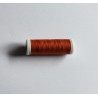 Sewing machine thread - burnt orange color - 200m spool, placed on a white background