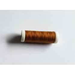 Sewing machine thread - bronze color - 200m spool, placed on a white background