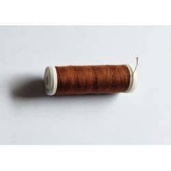 Sewing machine thread -chestnut color - 200m spool, placed on a white background