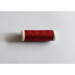 Sewing machine thread - burgundy color - 200m spool, placed on a white background