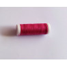 Sewing machine thread - fuchsia color - 200m spool, placed on a white background