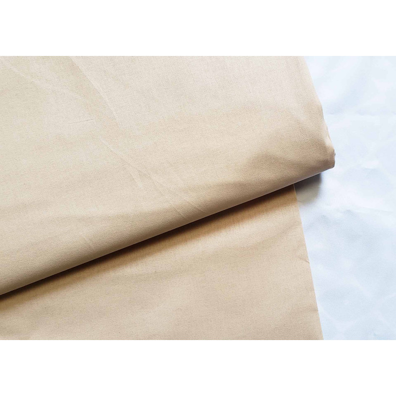 medium-weight cotton fabric - beige - the fabric with the fold, placed across the frame