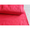 medium-weight cotton fabric - light red- the fabric with the fold, placed across the frame