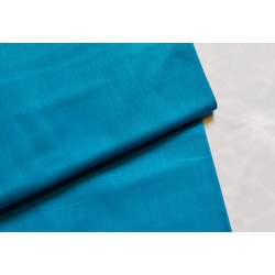 medium-weight cotton fabric -  intense turquoise color, the fabric with the fold, placed across the frame