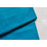 medium-weight cotton fabric -  intense turquoise color, the fabric with the fold, placed across the frame