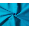 medium-weight cotton fabric -  intense turquoise color, the fabric with the twist, placed across the frame