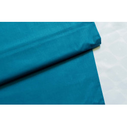 medium-weight cotton fabric -  peacock blue color, the fabric with the fold, placed across the frame