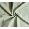 medium-weight cotton fabric -  light sage color, the fabric with the twist, placed across the frame