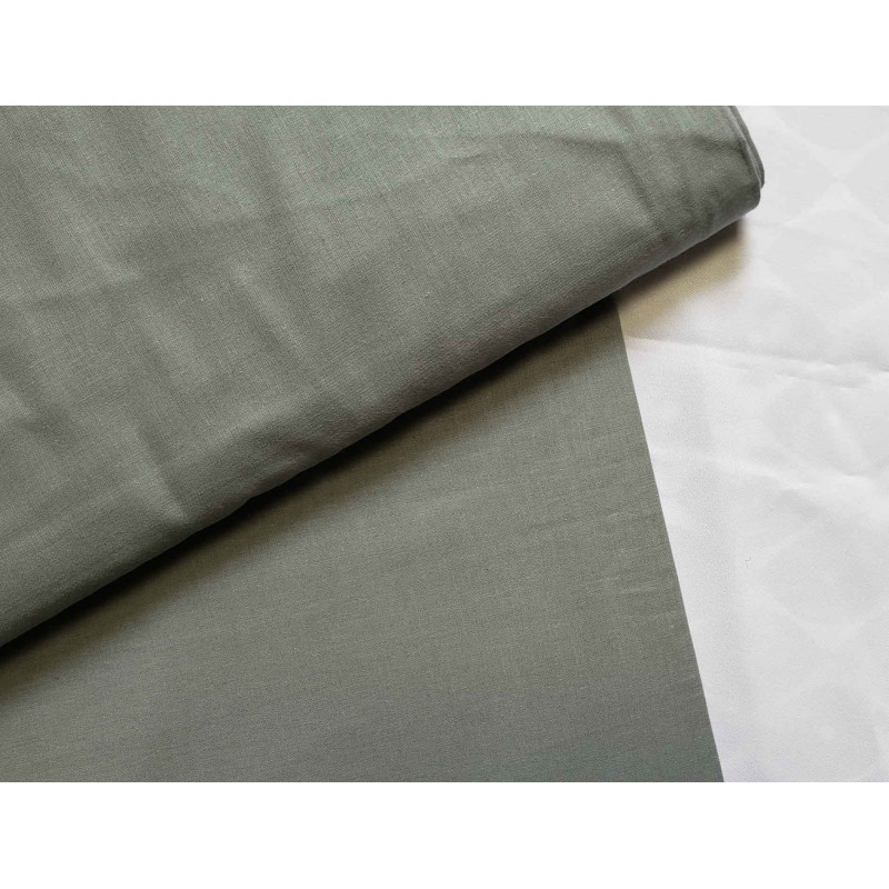 medium-weight cotton fabric -  sage color, the fabric with the fold, placed across the frame