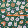 Dogs on green - Water Resistant fabric, the fabric with measuring tape across