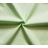 medium-weight cotton fabric -  light green color, the fabric with the twist, placed across the frame