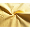 medium-weight cotton fabric -  mustard color, the fabric with the twist, placed across the frame