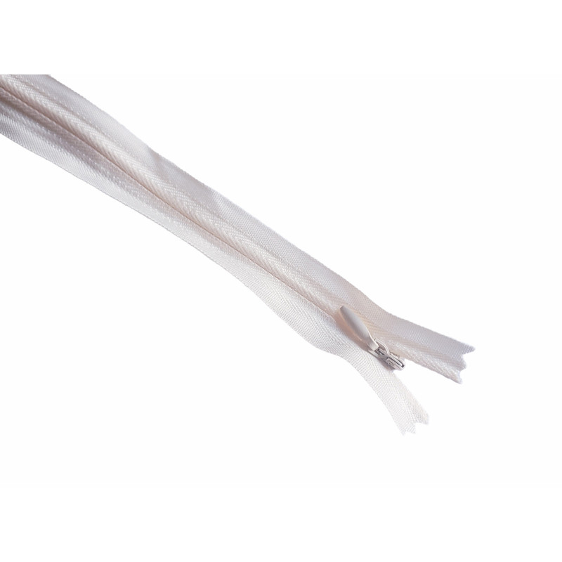 invisible zip cream - 40cm long, across the frame on a white background invisible zip cream - 40cm long, across the frame on a white background
