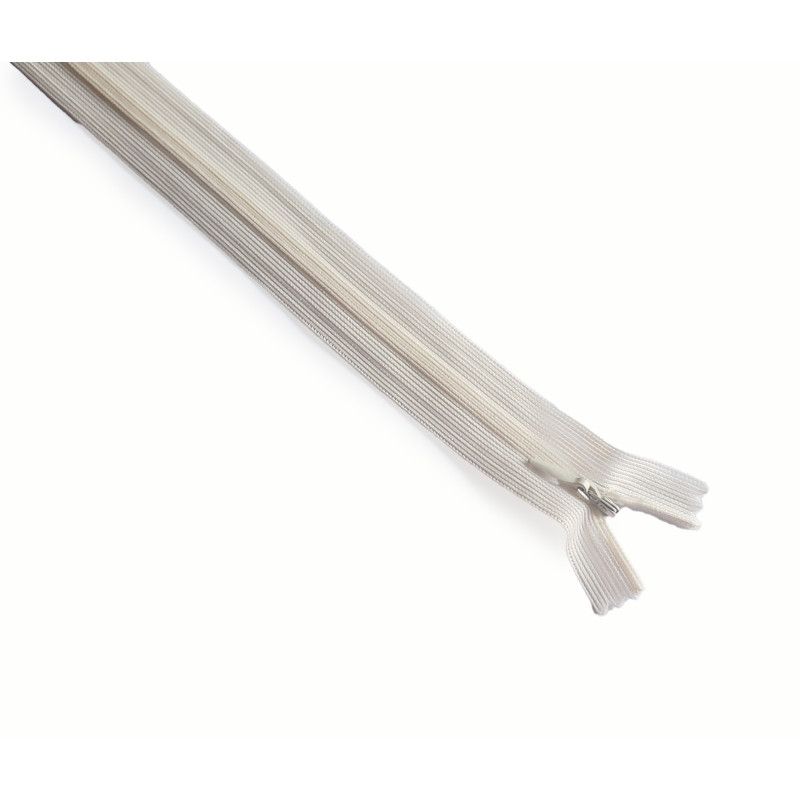 invisible zip cream - 25cm long, across the frame on a white background invisible zip cream - 25cm long, across the frame on a white background