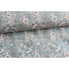 Ditsy floral cotton poplin - light teal, fabric with a fold across the frame