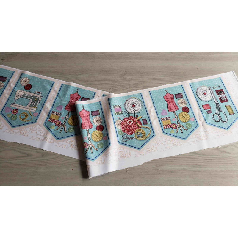 Bunting panel- Retro style sewing theme, placed across a grey table