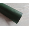 Self-Adhesive Faux leather fabric - dark green, the roll of the fabric placed across the grey table