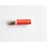 Sewing machine thread - coral orange color - 200m spool, placed on a white background