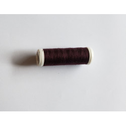 Sewing machine thread -  dark brown color - 200m spool, placed on a white background