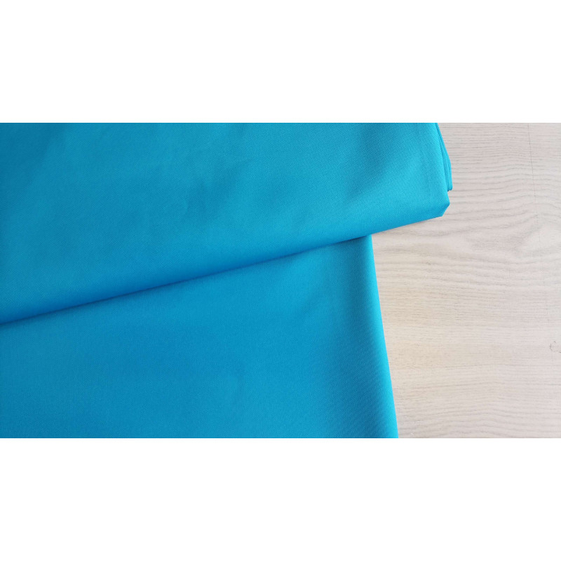 Oxford - Water-resistant canvas fabric  - deep turquoise, the fabric with the fold across the frame