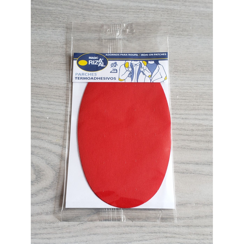 Iron-on cotton elbow patches - red on a grey table