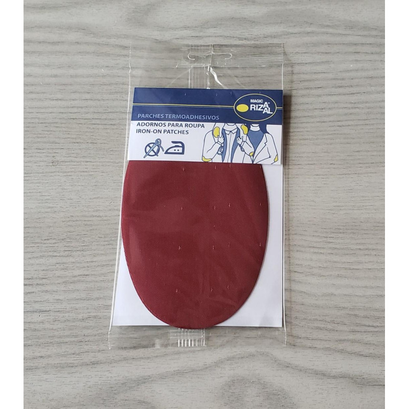 Iron-on cotton elbow patches - burgundy on a grey table