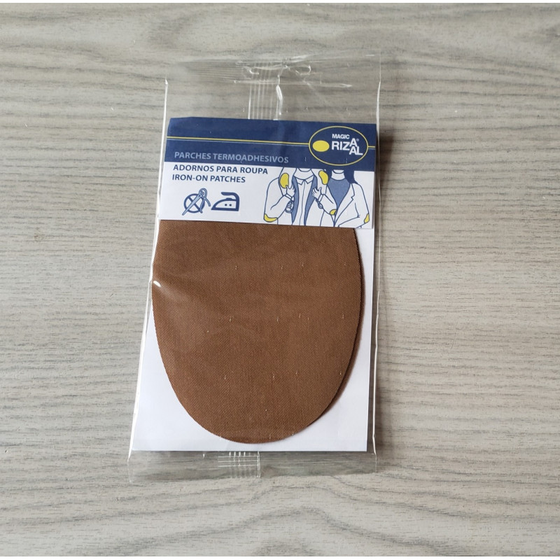 Iron-on cotton elbow patches - cinnamon on a grey table