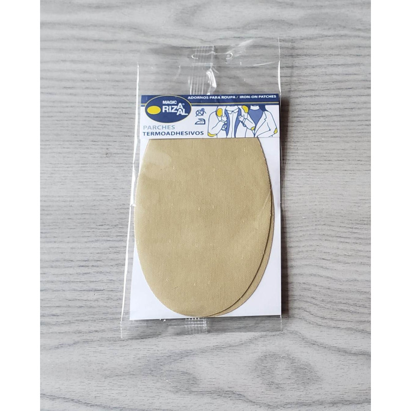 Iron-on cotton elbow patches - beige on a grey table