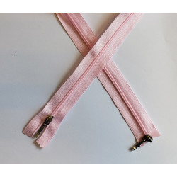 coil plastic double slider zip size 3 -light pink  - 80cm, crossed on the white background