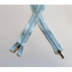 coil plastic double slider zip size 3 light blue  - 80cm, crossed on the white background