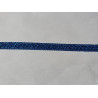 Upholstery trim 15mm - blue color, a strip of the trim placed on a grey table