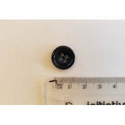 Small, navy color suit button with the ruler on a white background