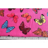 Colorful butterflies on hot pink- fleece, the fabric by the measuring tape, to show the size of the design