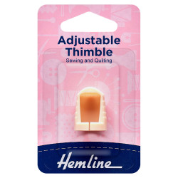 Plastic thimble - Adjustable - Multi-Size, the package on a white background