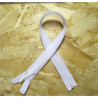 Invisible Zip 45 cm - white - open end zip on a wooden background