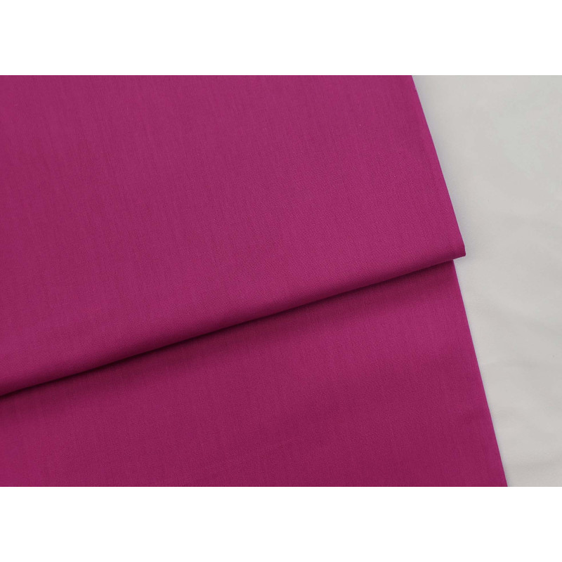 medium-weight cotton fabric -  fuchsia color, the fabric with the fold, placed across the frame