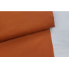 medium-weight cotton fabric - dark orange - the fabric with the fold, placed across the frame