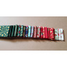 Jelly roll pre-cuts bundle - Christmas metallic designs 2,5''/20'', all designs placed in a row on a natural background