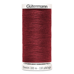 Sewing machine thread -  Burgandy color - 200m spool, placed on a white background