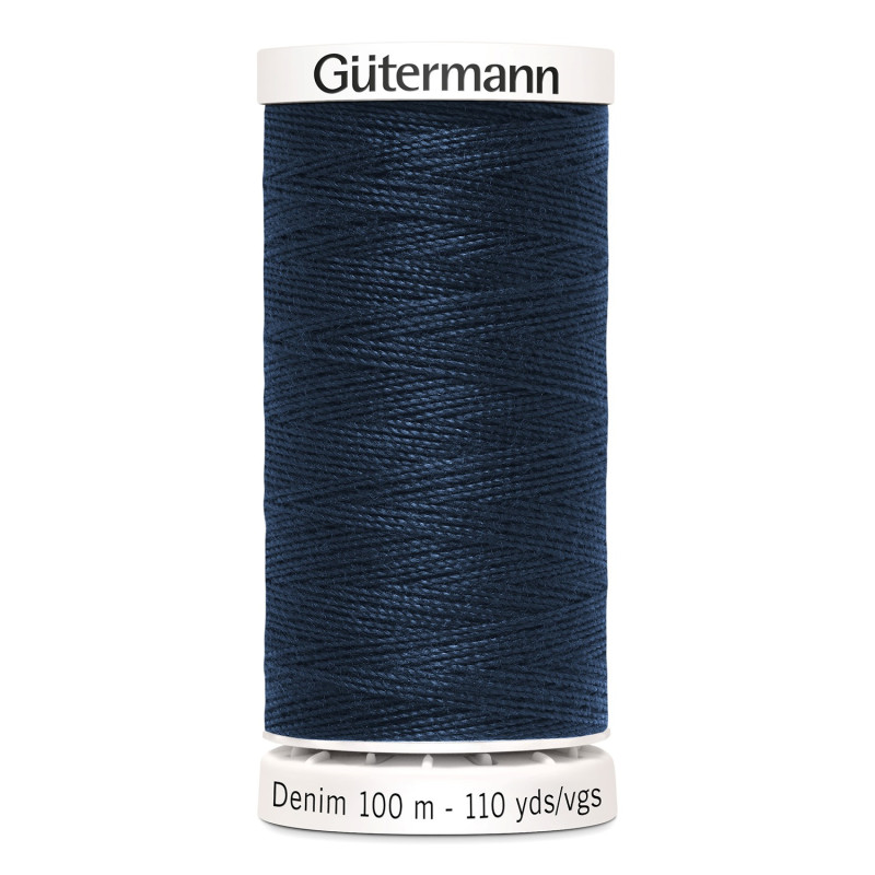 Sewing machine thread -   Dark navy denim color - 200m spool, placed on a white background