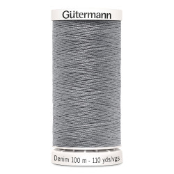 Sewing machine thread -   Darker grey color - 200m spool, placed on a white background