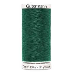 Sewing machine thread -   Dark green color - 200m spool, placed on a white background