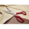 Dressmaking scissors - 9in or 23cm, placed on a wooden table with a piece of the fabric