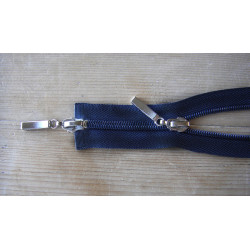 double slider coil zip - navy - 75cm long, placed on a wooden background, close up on zip details