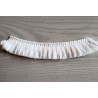 Short cotton fringe 3cm - white, piece of the fringing placed on a grey table