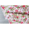 Rose bunches Cotton Poplin - on a light pink background, the fabric with the fold