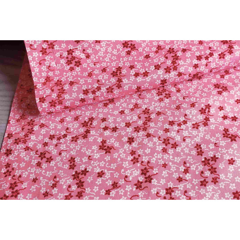 Ditsy Daisy Cotton Poplin - old rose background, the fabric with the fold